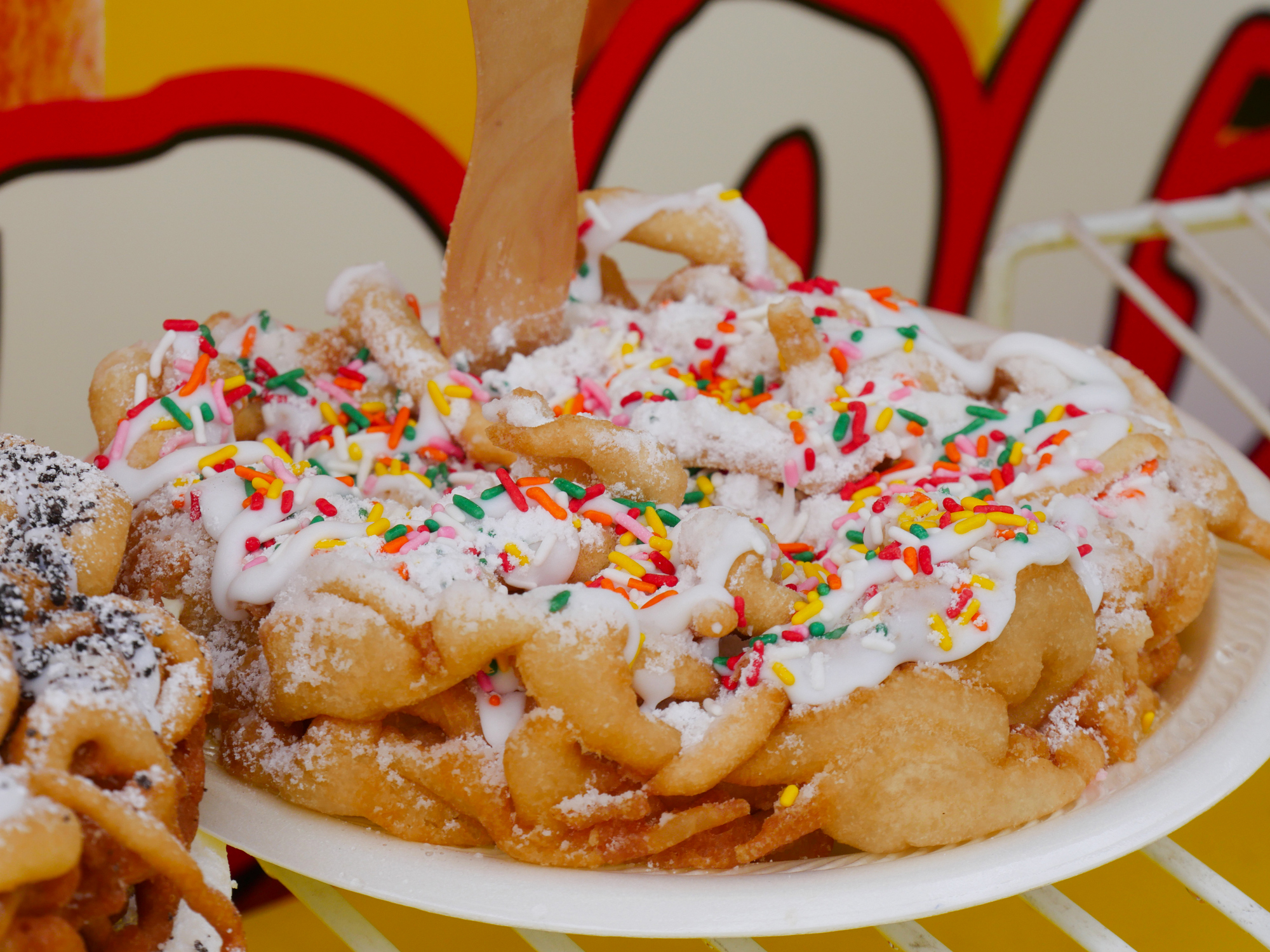 Funnel cakes, kettle corn and BBQ at fair food stands